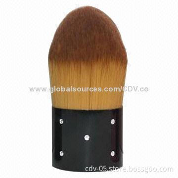 Kabuki makeup brush with bling-bling handle and pointed tip